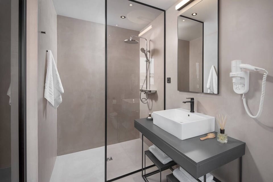 Shower, free toiletries, hair dryer, slippers