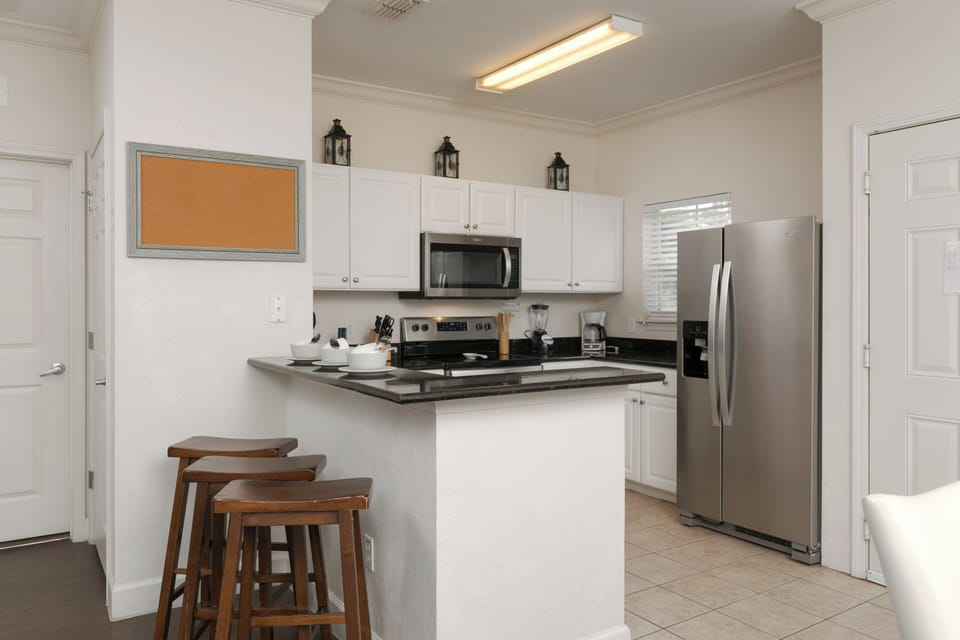 Stylish kitchen counter stools offer comfortable, contemporary seating.