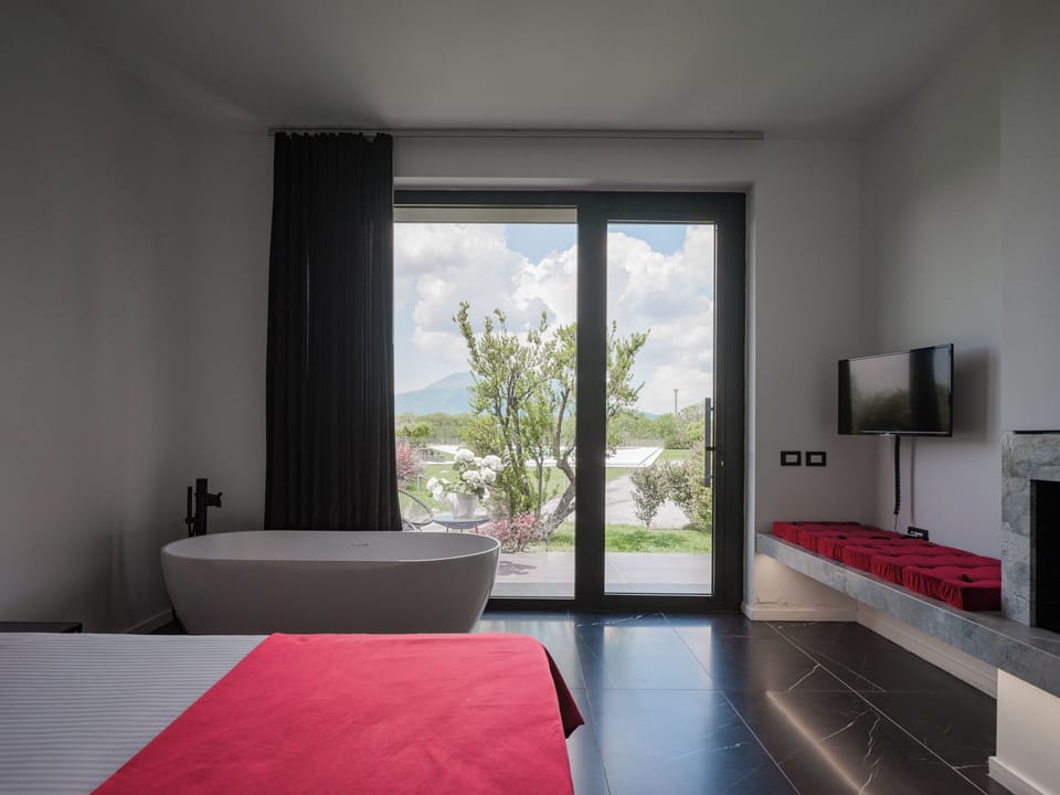 Deluxe Double Room, 1 Bedroom, Bathtub, Pool View | Premium bedding, minibar, blackout drapes, soundproofing
