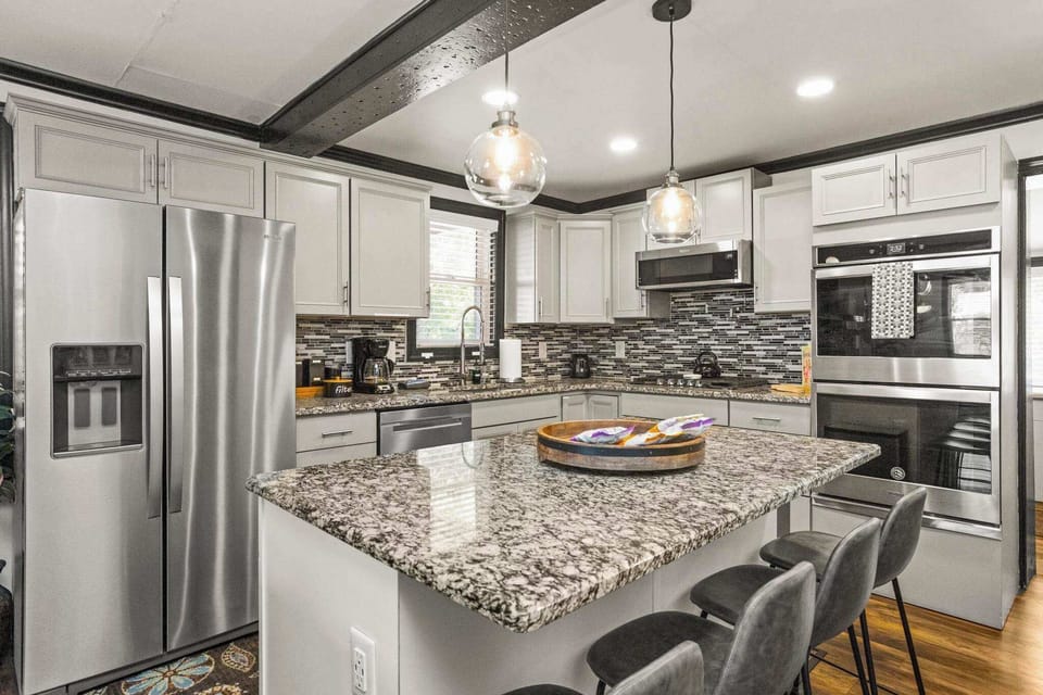 Fully Stocked Gourmet Kitchen with Island Seating