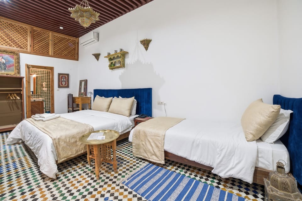 Double or Twin Room | Desk, blackout drapes, cribs (free), WiFi (free)