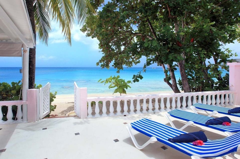 The lovely deck leading out to white sands