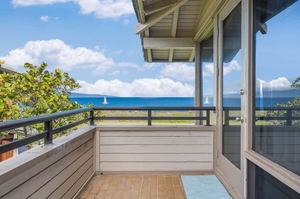 Relax in a tropical paradise with a private lanai and fresh air.