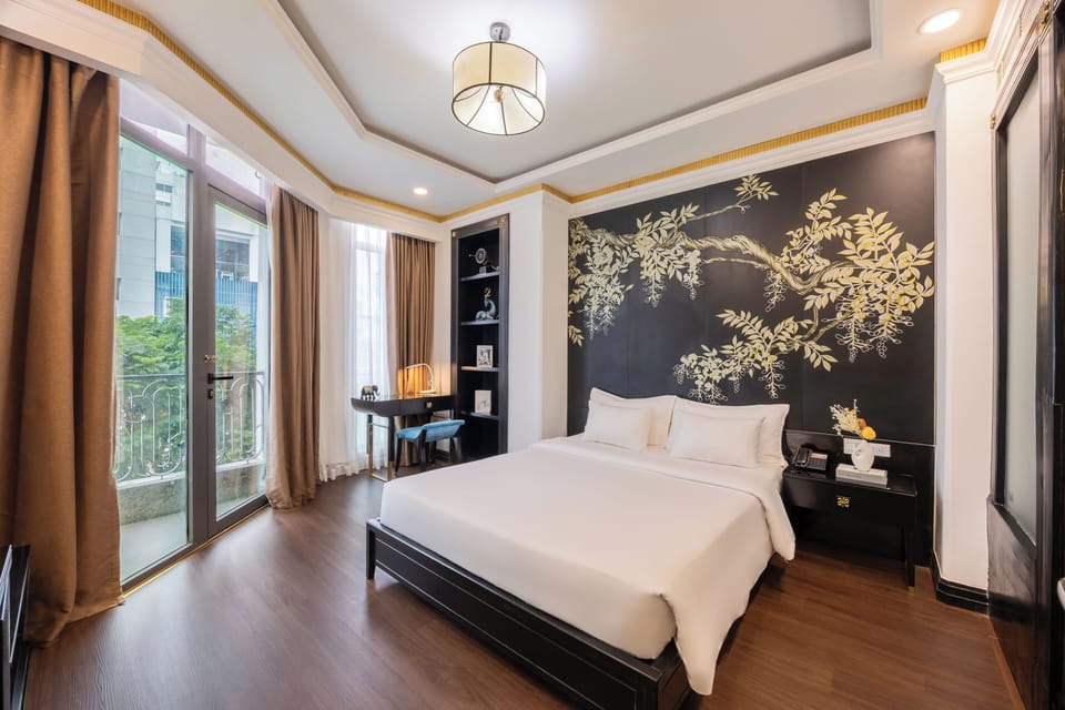 Deluxe Double Room, City View | Minibar, in-room safe, blackout drapes, iron/ironing board