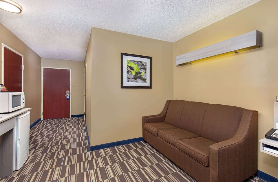 Suite, 1 Queen Bed with Sofa bed, Accessible, Non Smoking (Mobility) | Desk, blackout drapes, iron/ironing board, free cribs/infant beds