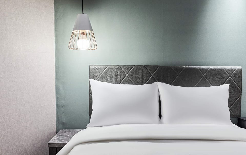 Down comforters, free minibar, desk, blackout drapes