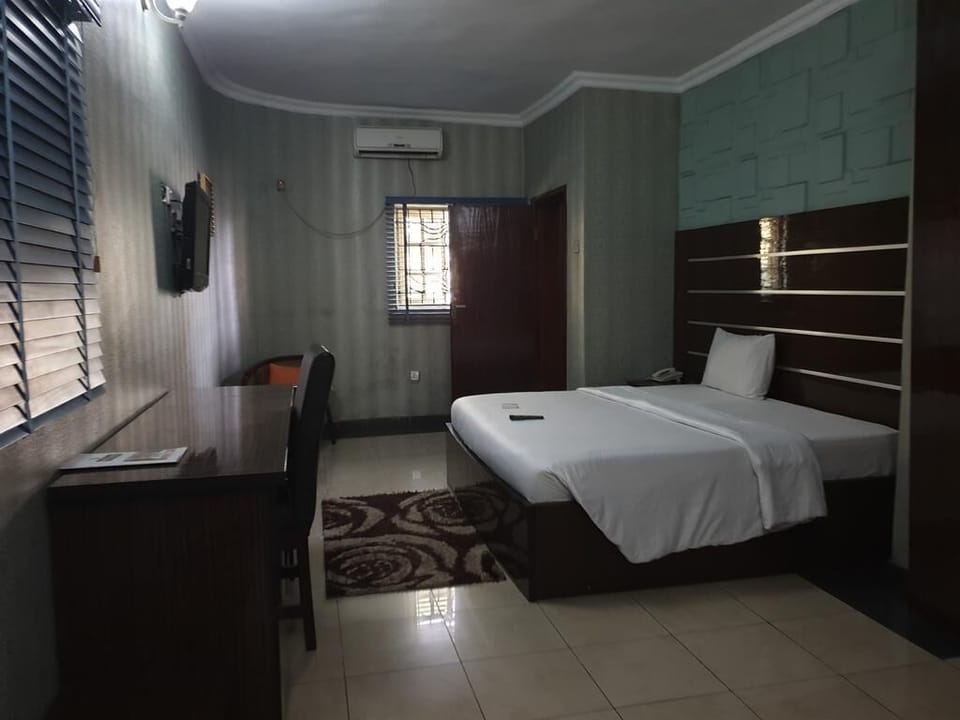 Deluxe Room | Desk, laptop workspace, free WiFi, bed sheets
