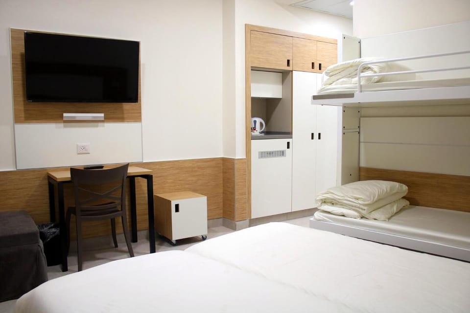 Minibar, desk, blackout drapes, soundproofing