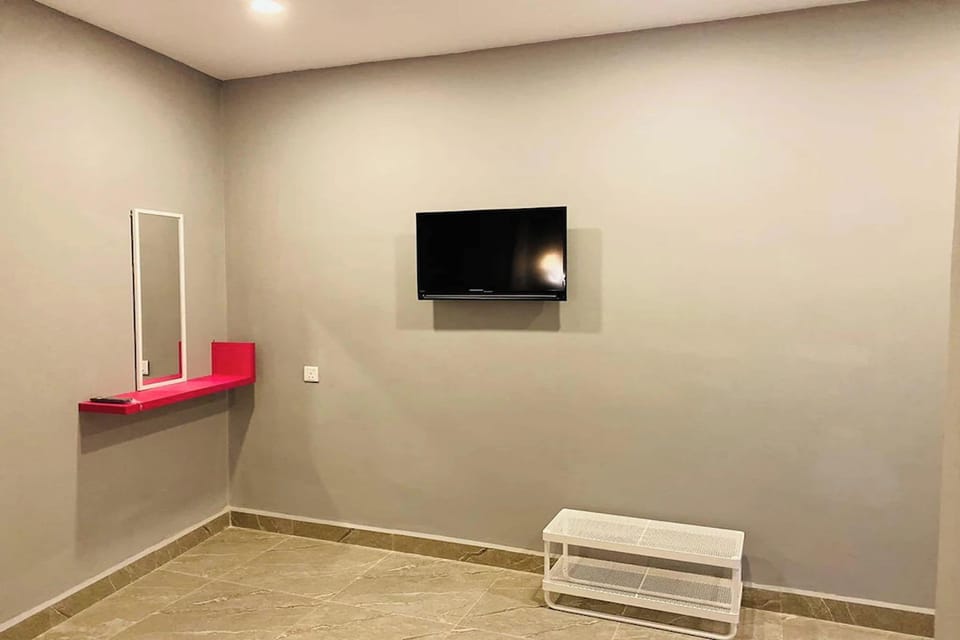 Desk, blackout drapes, soundproofing, iron/ironing board