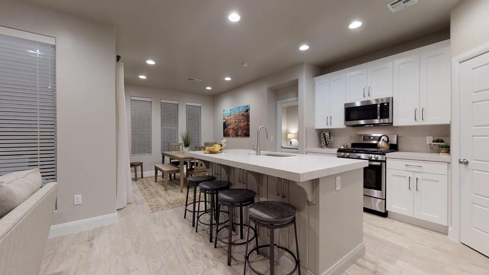 Townhome, 4 Bedrooms | Private kitchen | Fridge, microwave, oven, stovetop