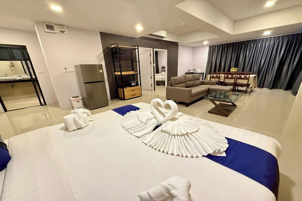 Family Quadruple Room | Living area | TV, DVD player