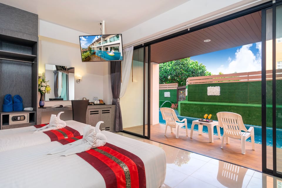 2 Bedroom Family Pool Access Room | In-room safe, desk, laptop workspace, blackout drapes