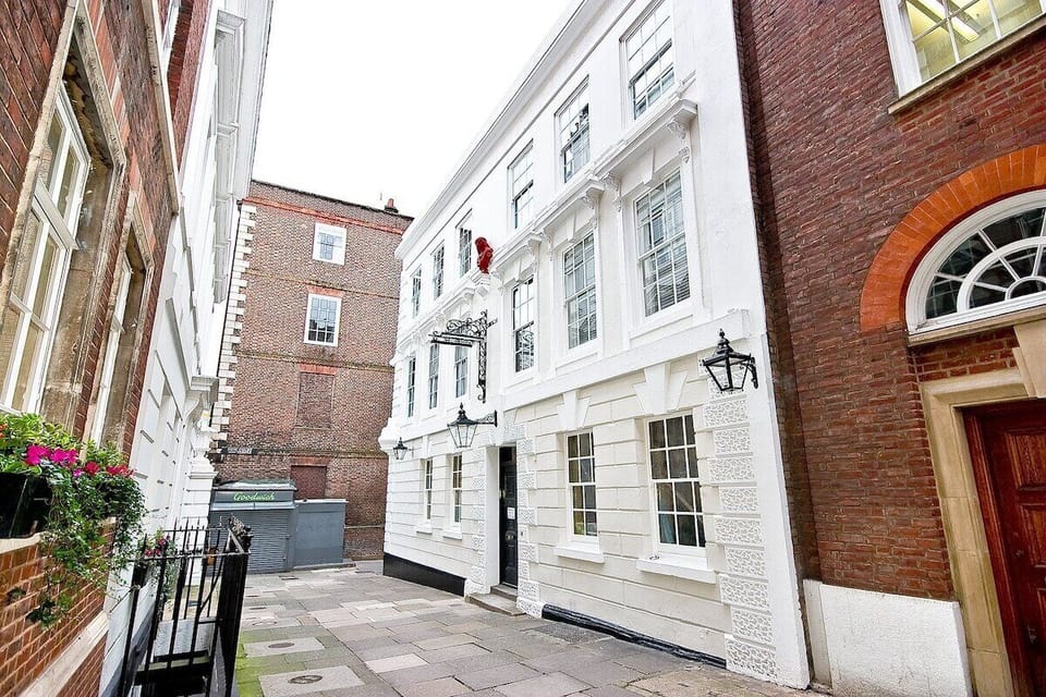 Handsome White Stucco Fronted Building