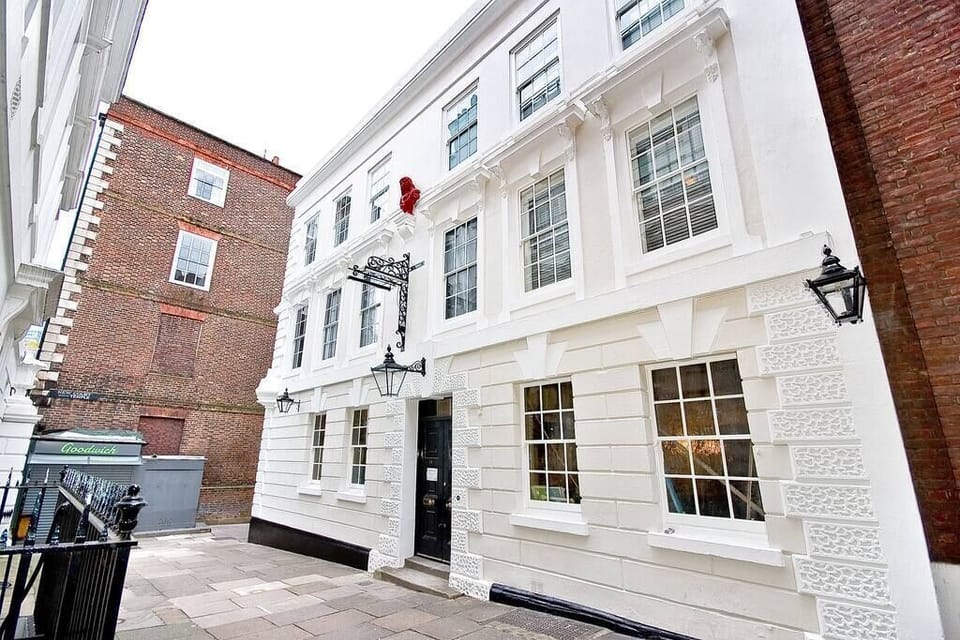 Handsome White Stucco Fronted Building