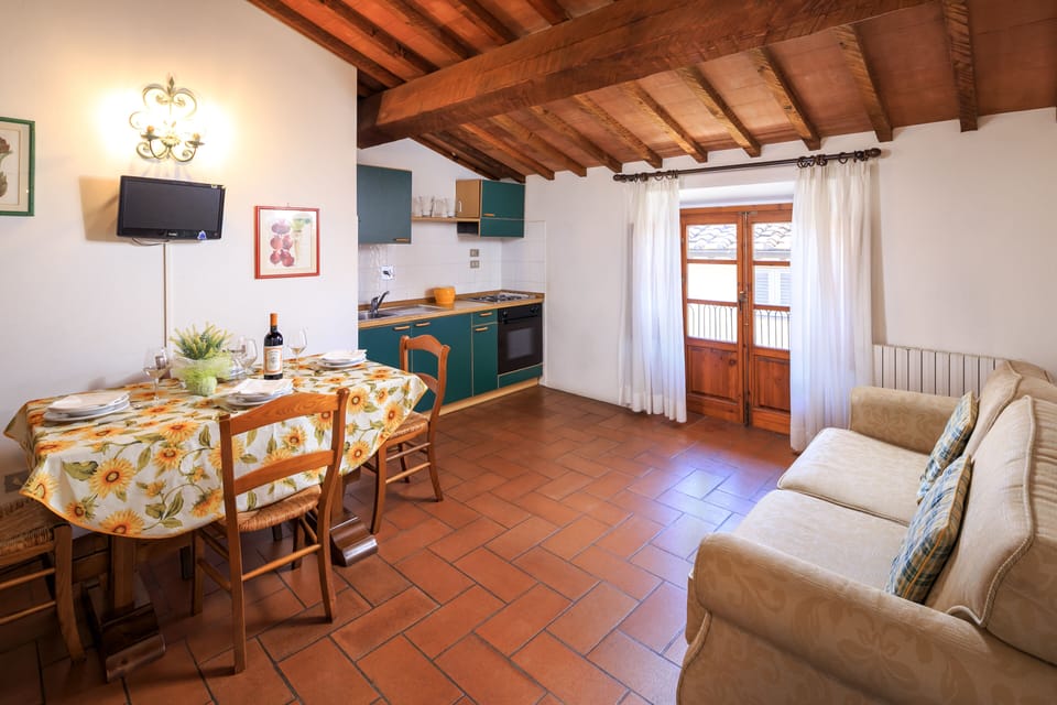 Standard Apartment, 1 Bedroom | Living room | 21-inch flat-screen TV with cable channels, TV