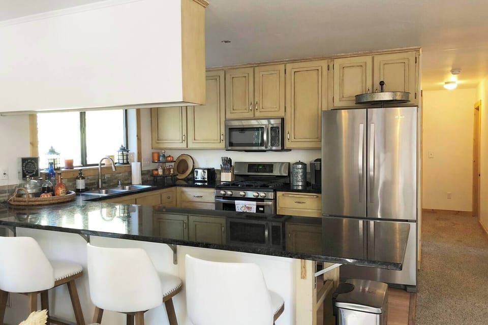 Updated Kitchen with a breakfast bar and seating.