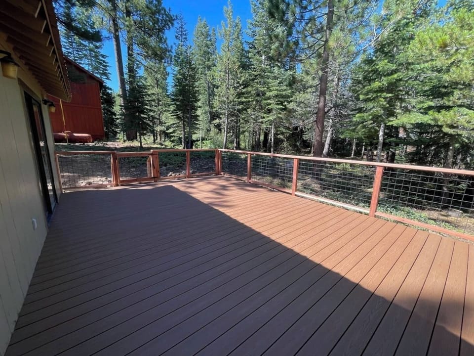 Brand new SPACIOUS deck nestled in the trees