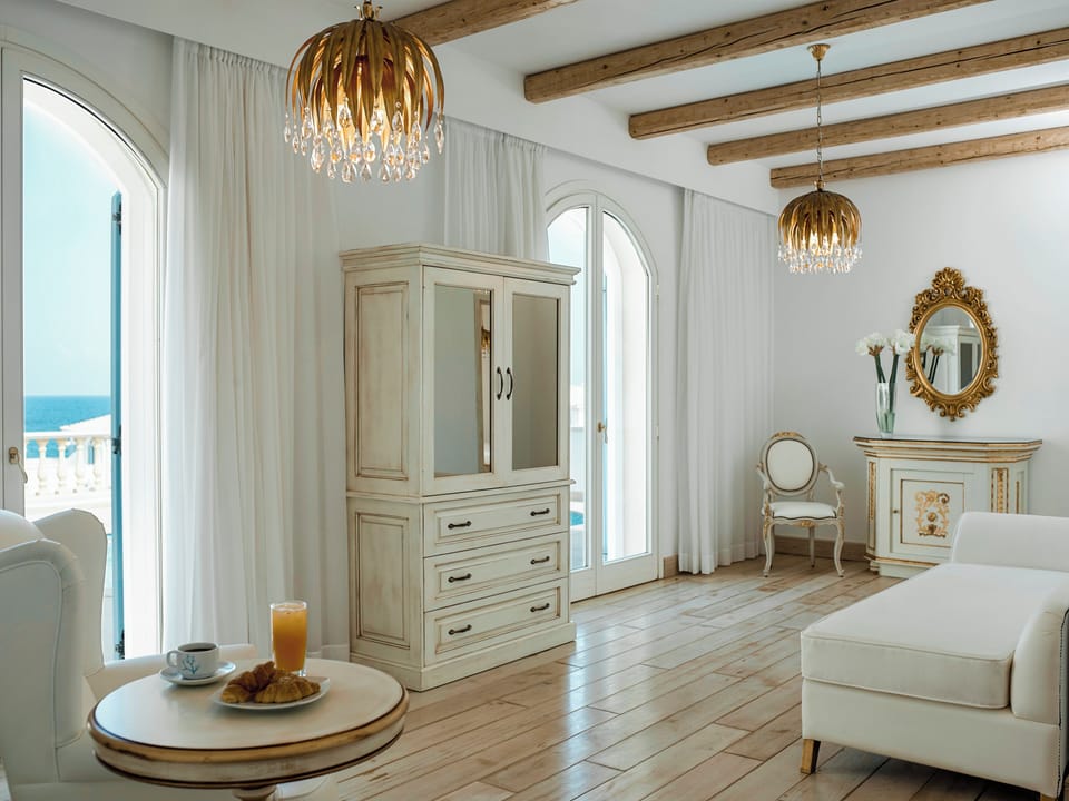 Presidential Suite | Living area | 50-inch flat-screen TV with digital channels, TV