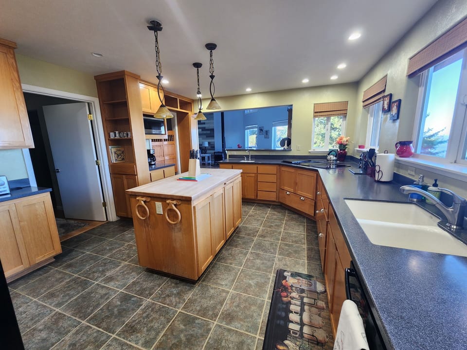 Spacious and accomidating kitchen with stunning ocean views.