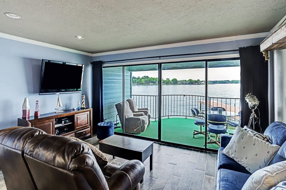 Two large flat screen TV's in condo