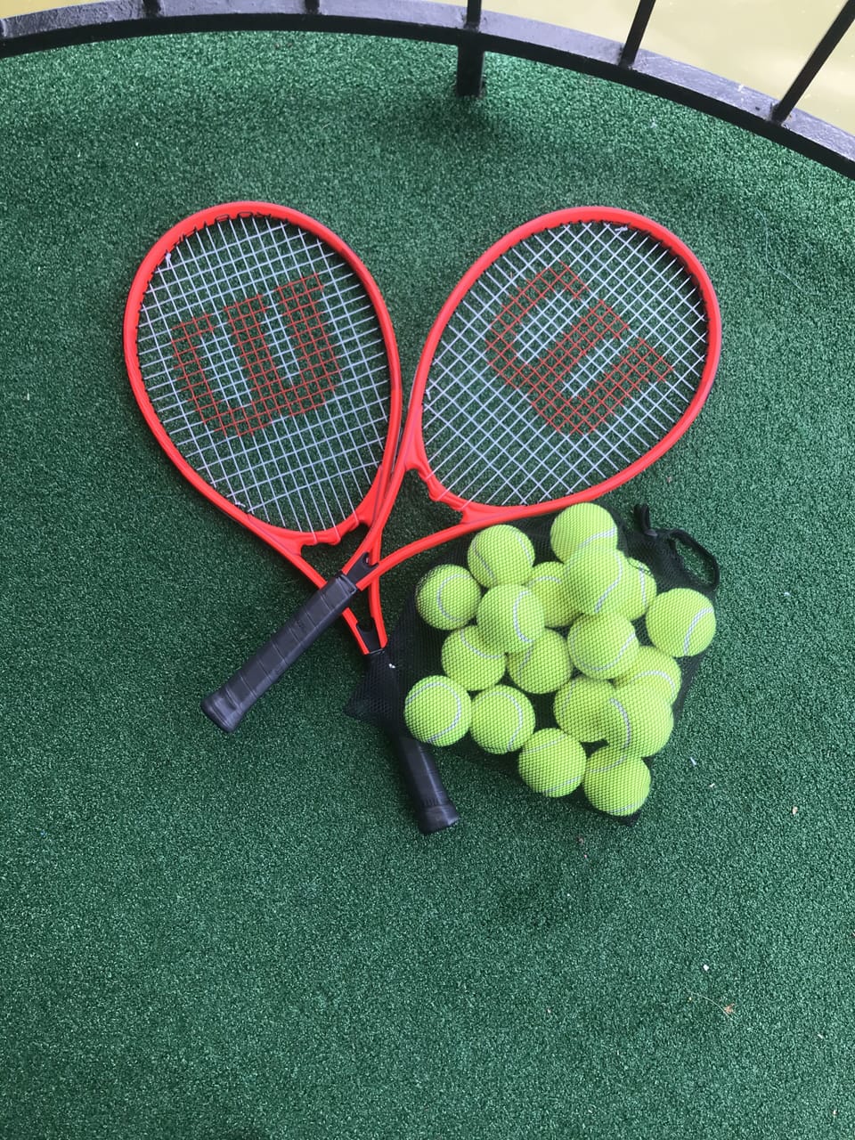 Rackets and balls kept at condo for guest use