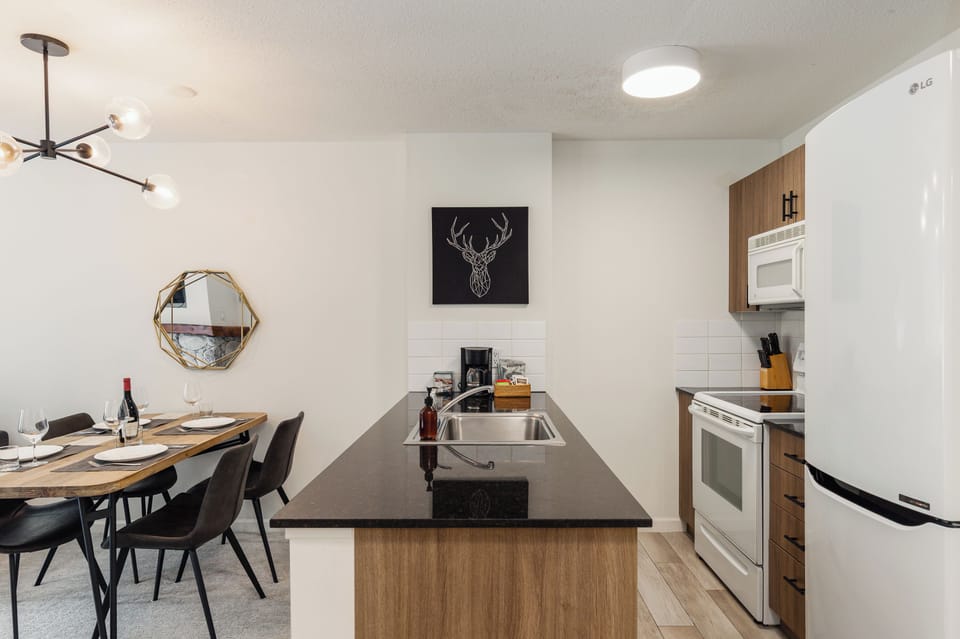 Kitchen - fully stocked with cooking basics and coffee, tea, and hot chocolate. Ideal for those who are not looking to eat out every meal!