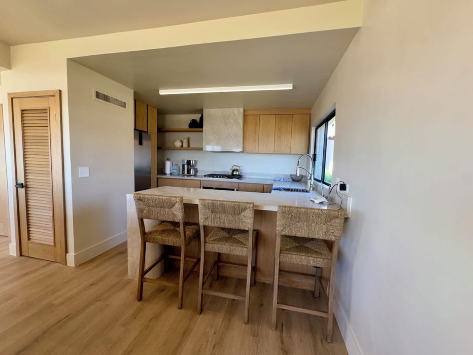 Modern Wabi-Sabi kitchen featuring Taj Mahal quartz countertops 