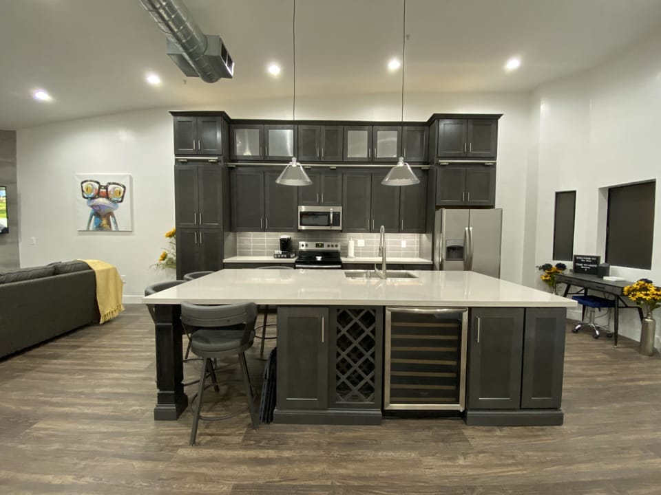 Huge kitchen with floor to ceiling custom cabinetry.
