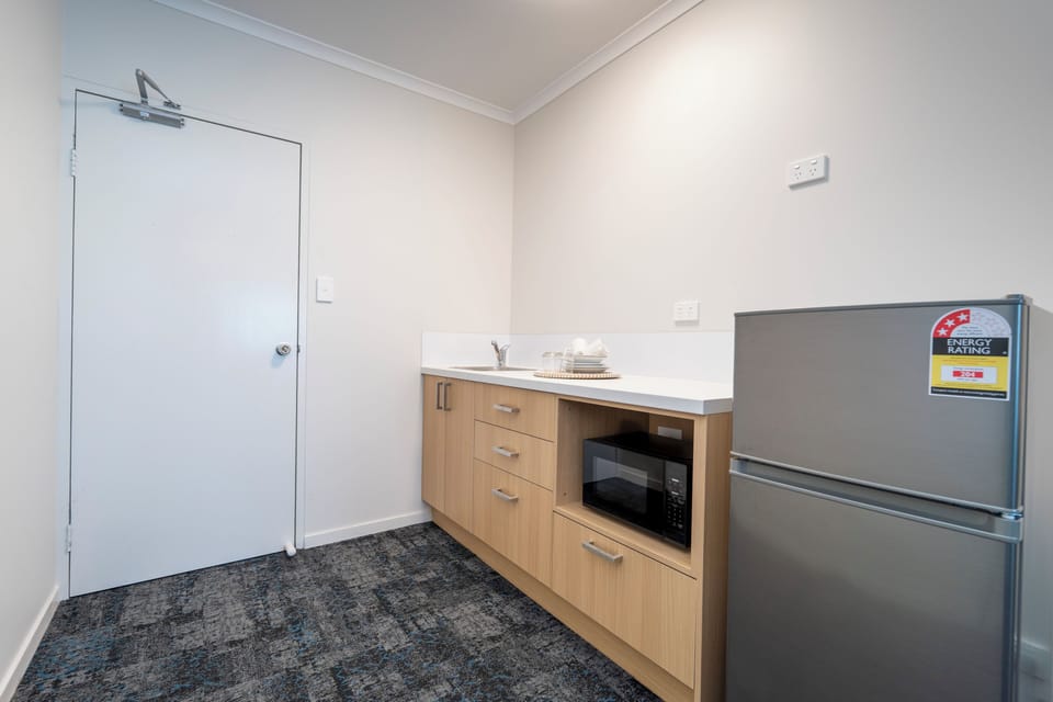 Interconnecting Queen Kit & Small Family | Desk, laptop workspace, blackout drapes, iron/ironing board