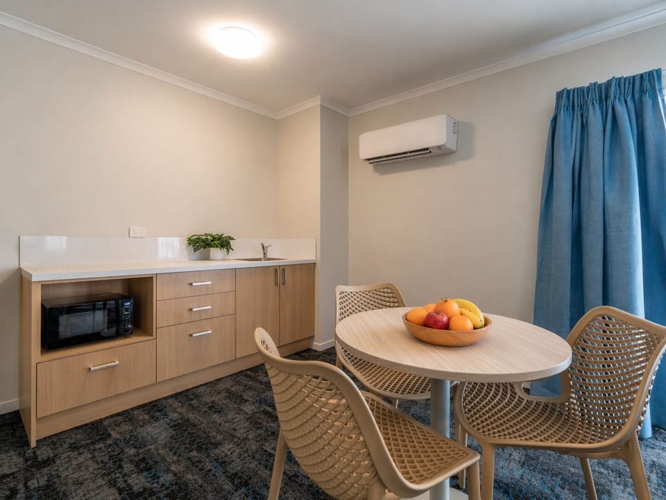 1 Bedroom with Kitchenette | Living area | 42-inch Smart TV with digital channels