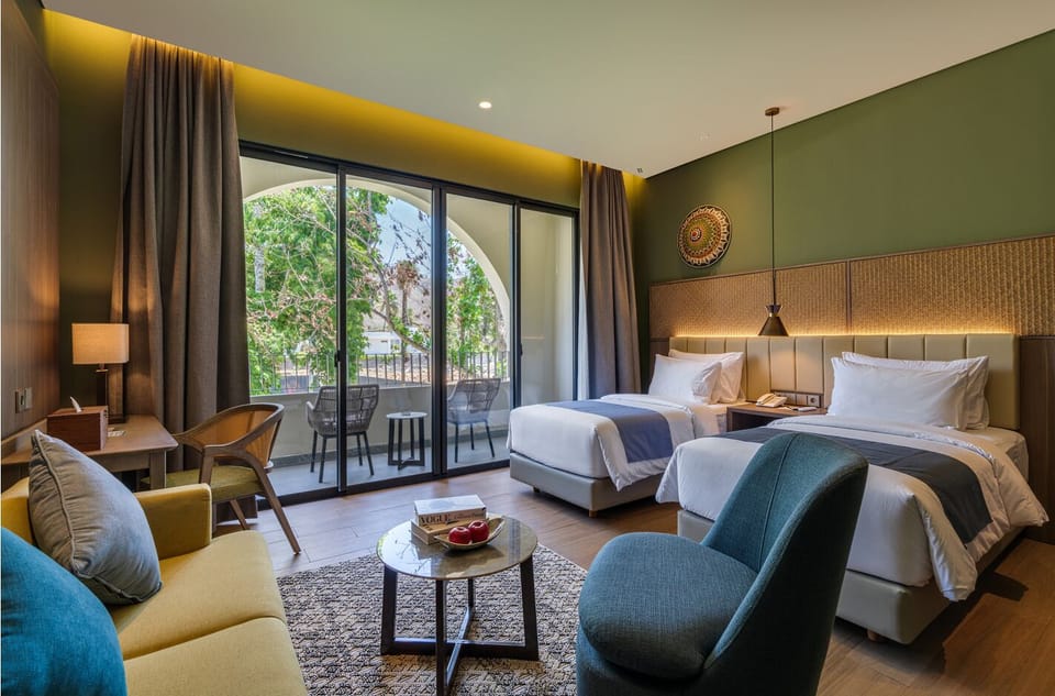 Grand Deluxe Twin, Pool View | Minibar, in-room safe, desk, blackout drapes