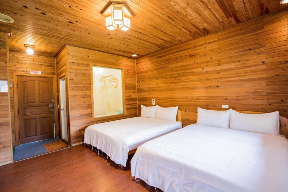 Premium bedding, desk, blackout drapes, soundproofing