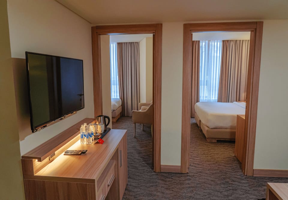 Family Suite, 2 Bedrooms | Egyptian cotton sheets, premium bedding, down comforters, pillowtop beds