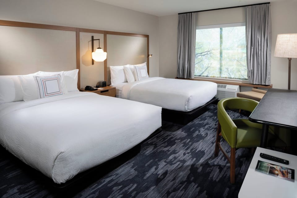 Pillowtop beds, desk, laptop workspace, blackout drapes