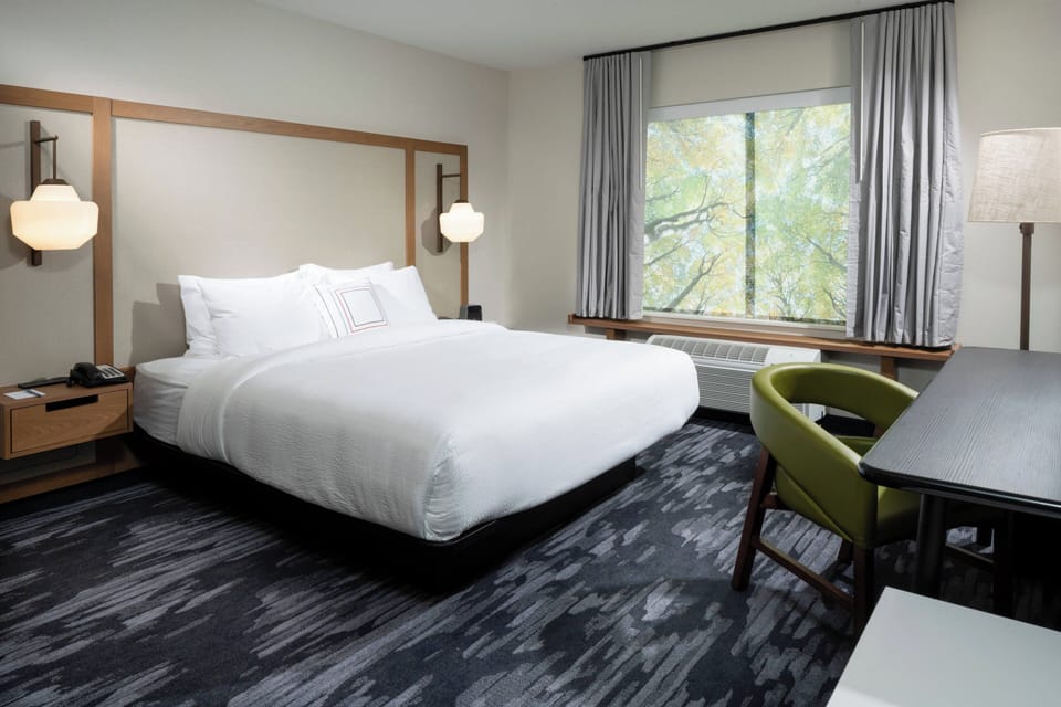 Pillowtop beds, desk, laptop workspace, blackout drapes