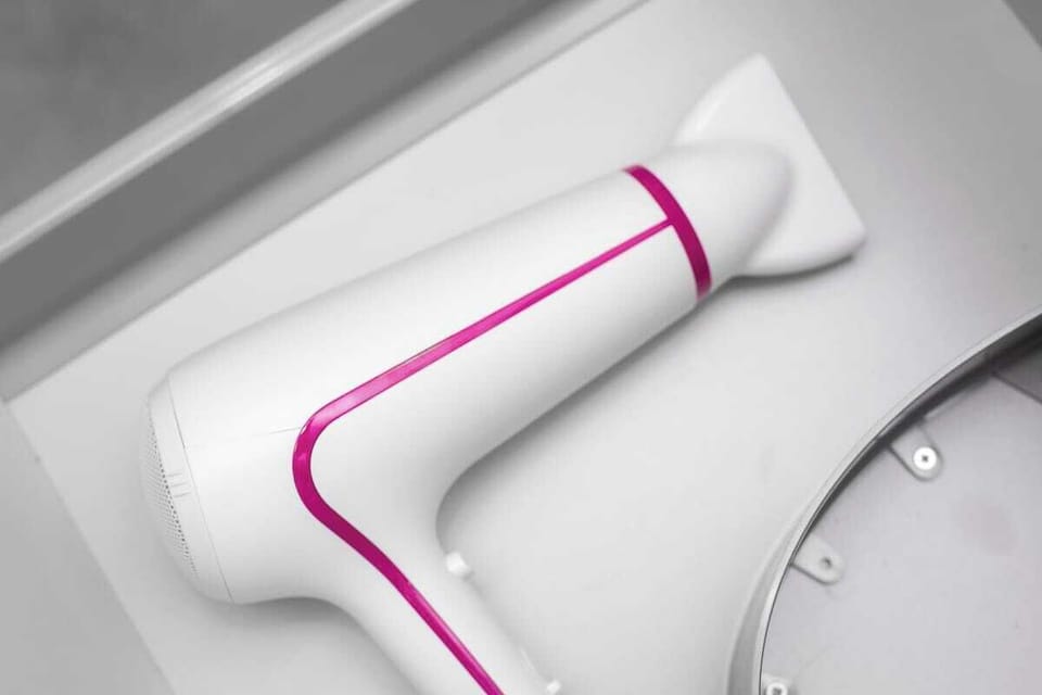 A close-up of a sink with modern fixtures, showing a clean and sleek design.