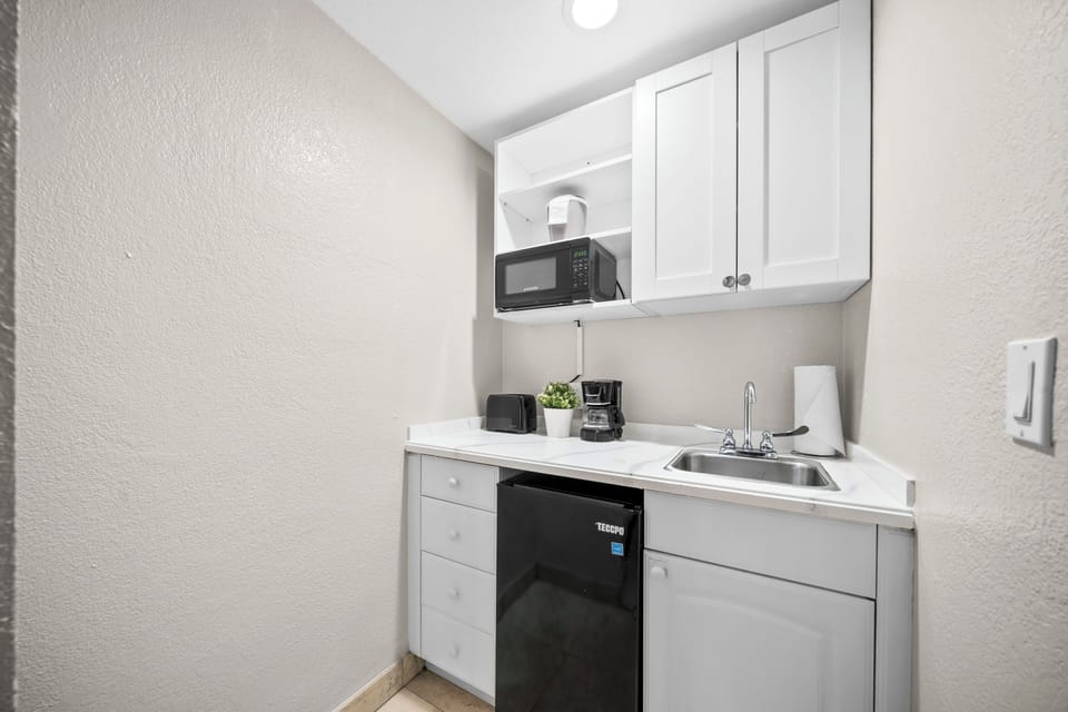 Mini-fridge, microwave, coffee/tea maker, toaster