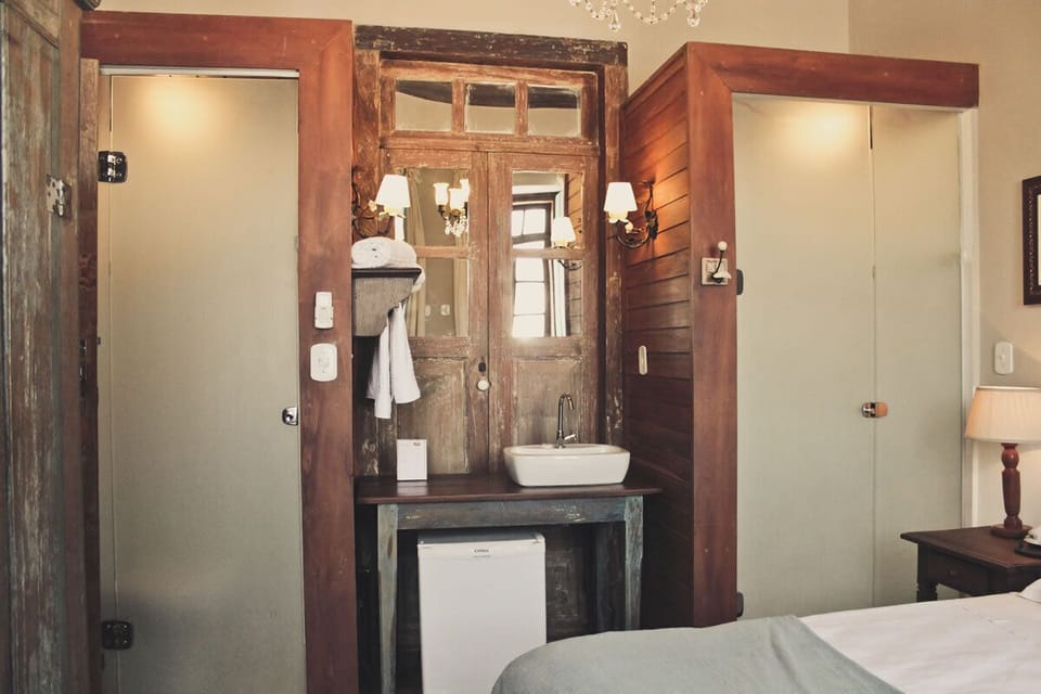 Deluxe Double or Twin Room | Minibar, in-room safe, desk, blackout drapes