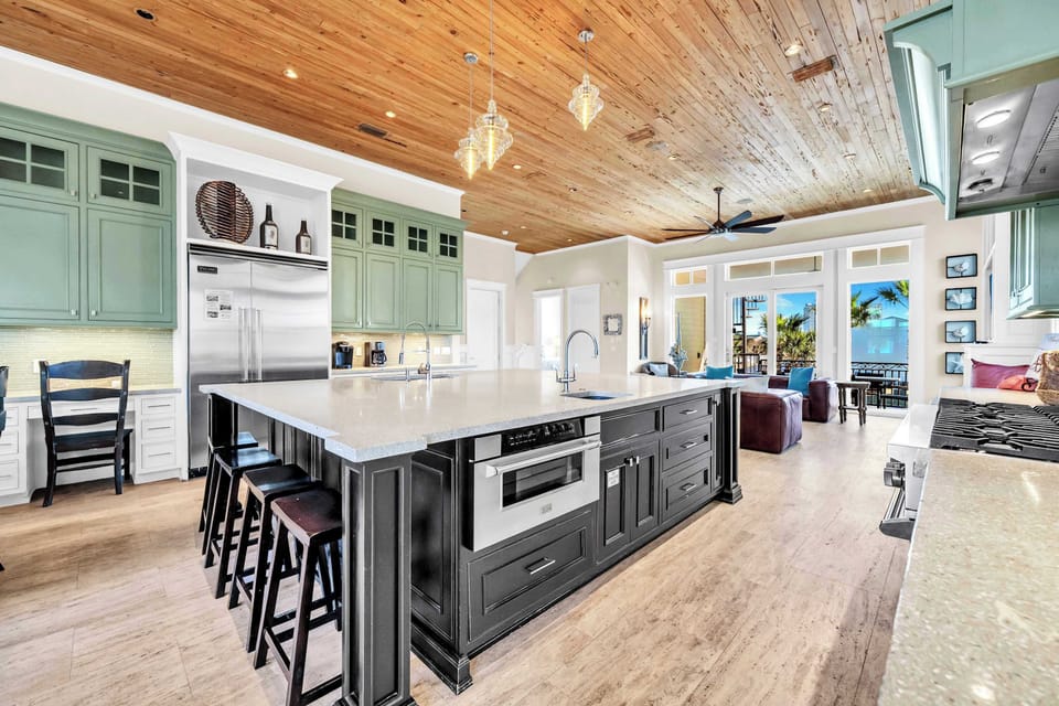 The 2nd Floor Kitchen Boasts a Huge Kitchen Island With Tons Of Prep Space.