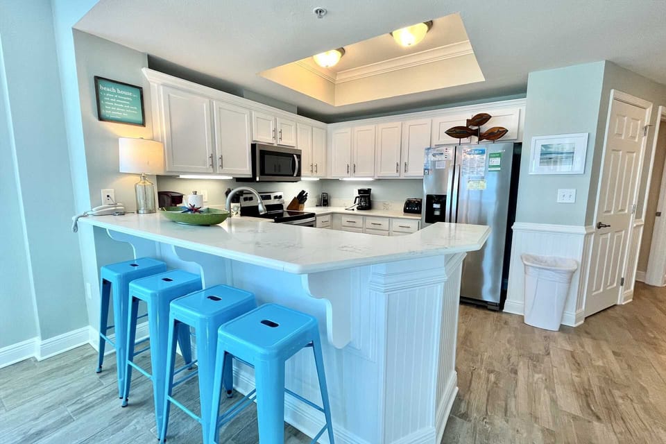 Prepare homecooked meals in the well-equipped kitchen with quality appliances.