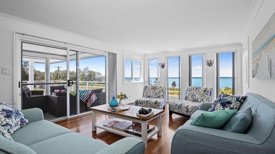 Bay Views |  Upstairs lounge room with water views | Wi-Fi | Covered outdoor balcony