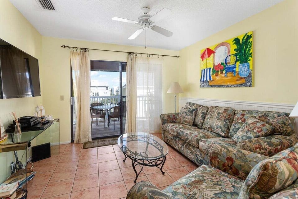 Shipwatch 309 - Living room area with access to the balcony