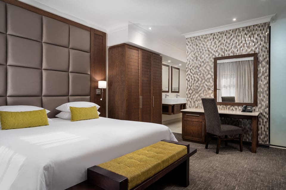 Suite, 1 King Bed | Premium bedding, in-room safe, desk, laptop workspace