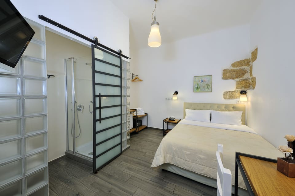 Economy Double Room, Patio, Ground Floor | Down comforters, pillowtop beds, in-room safe, desk