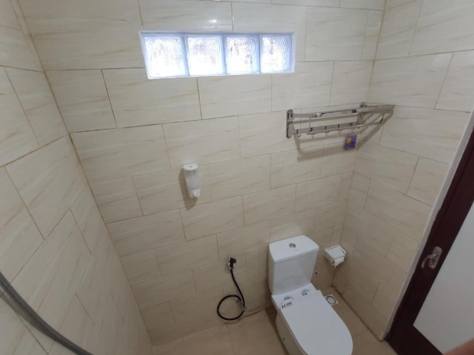 Shower, towels, soap, shampoo