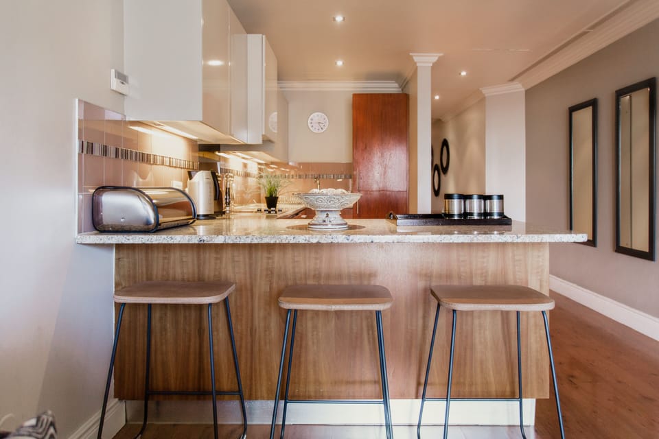 Signature Apartment | Private kitchen | Full-size fridge, oven, stovetop, electric kettle