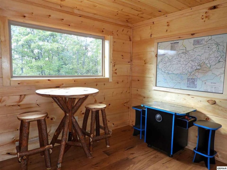 Loft area with table top arcade and table and chairs