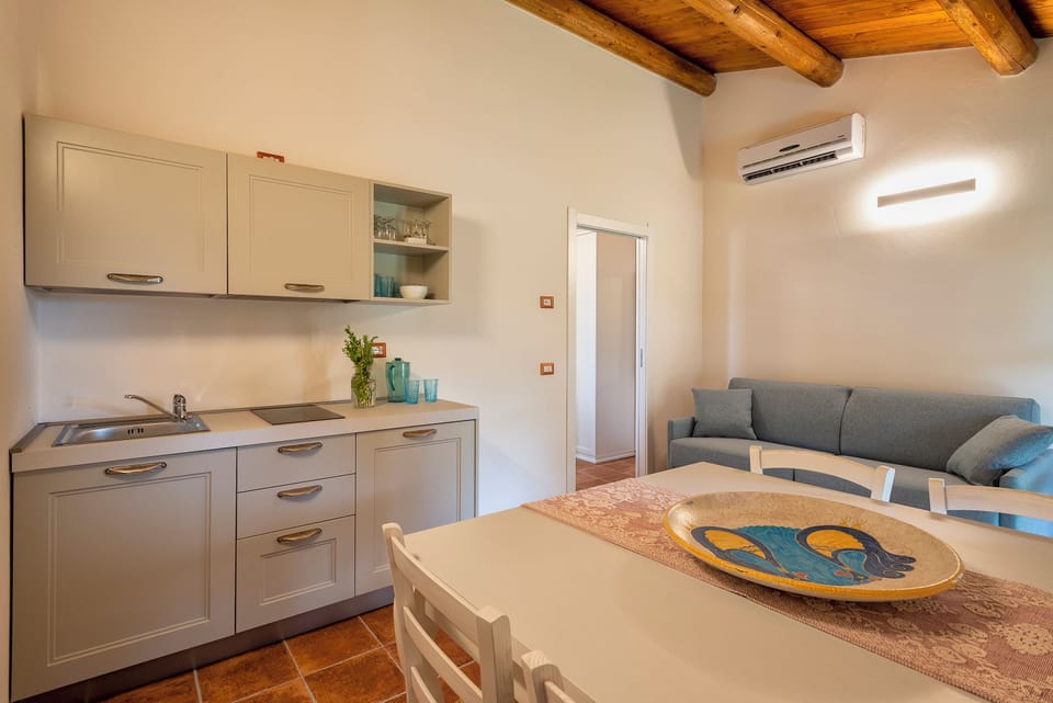 Apartment, 1 Bedroom | 1 bedroom, Egyptian cotton sheets, down comforters, minibar