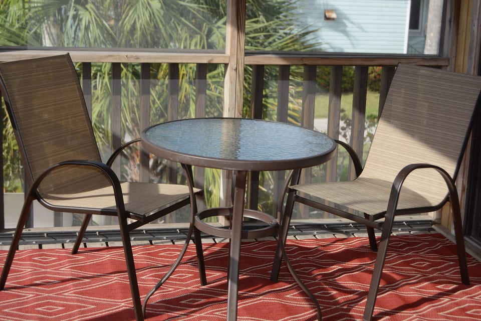 Screened porch on front of apartment - west facing.
