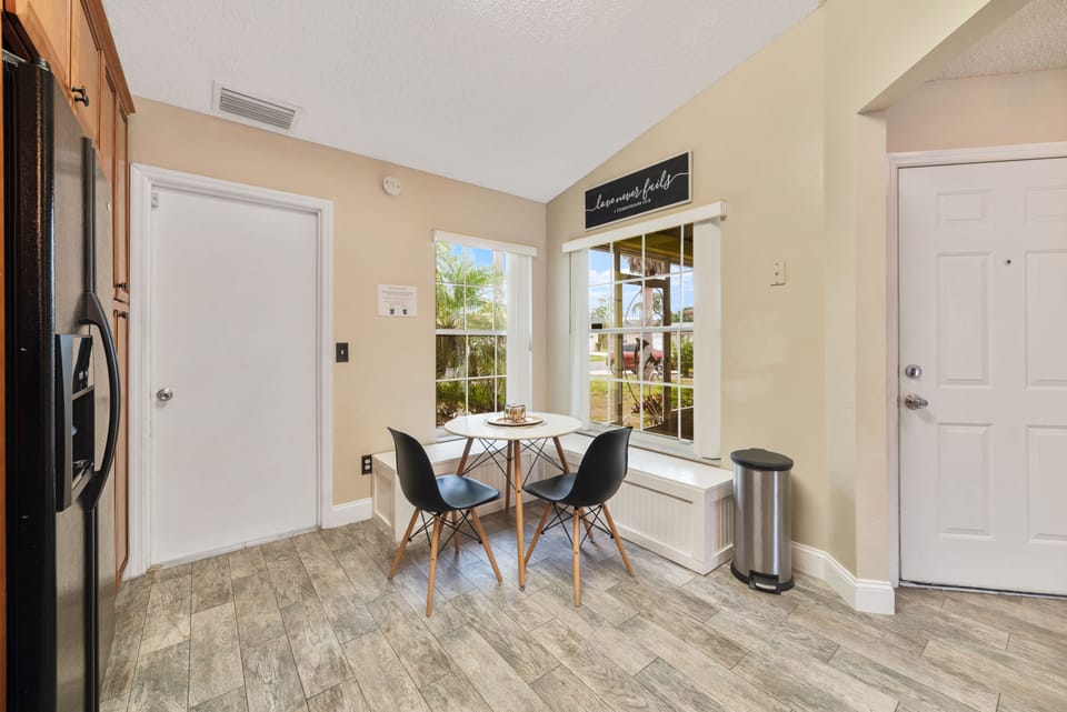Enjoy your morning coffee with views of the grand queen palms